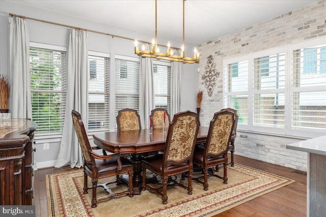 101 Dyer Ct, Herndon, VA 20170 - dining space featuring a chandelier and wood finished floors