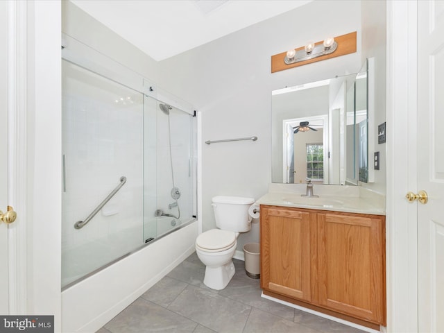 full bath with toilet, combined bath / shower with glass door, vanity, ceiling fan, and tile patterned floors