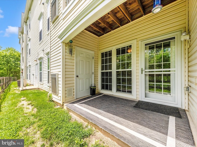 doorway to property with fence