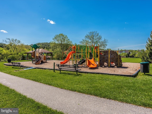 communal playground with a lawn
