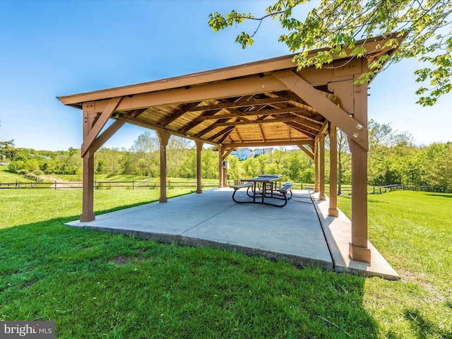 view of community featuring a gazebo and a patio