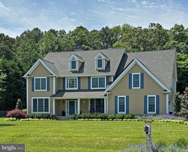 168 Williams Way, Lewes, DE 19958 - view of front of home with a porch, a front lawn, a chimney, and roof with shingles