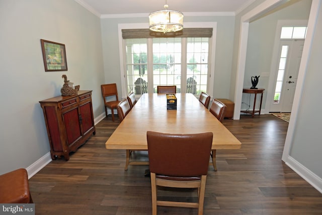 168 Williams Way, Lewes, DE 19958 - dining area with healthy amount of natural light, dark wood-style flooring, ornamental molding, baseboards, and a chandelier