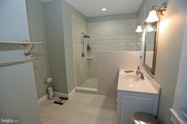 168 Williams Way, Lewes, DE 19958 - full bath with tiled shower, vanity, tile patterned floors, baseboards, and recessed lighting