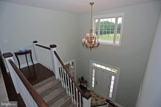 168 Williams Way, Lewes, DE 19958 - stairway with a chandelier and baseboards