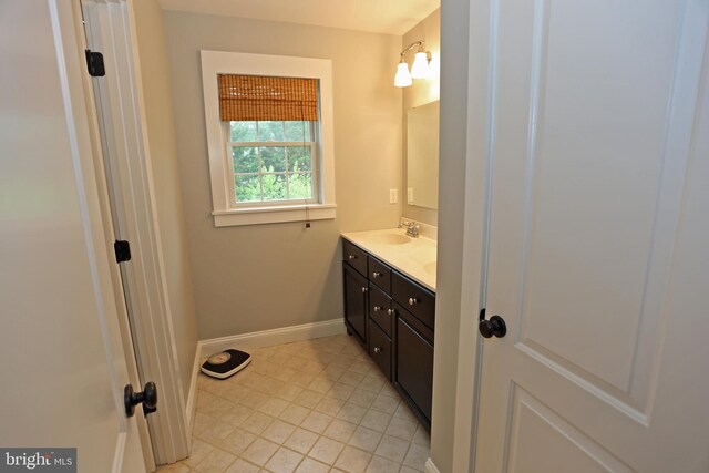 168 Williams Way, Lewes, DE 19958 - bathroom with baseboards, vanity, and tile patterned floors