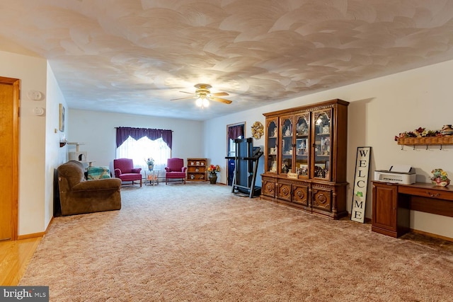 36 Spruce St, Smithmill, PA 16680 - living area featuring a ceiling fan, light colored carpet, and baseboards