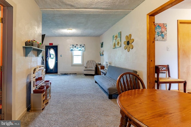 36 Spruce St, Smithmill, PA 16680 - carpeted living area featuring a wood stove and a textured ceiling