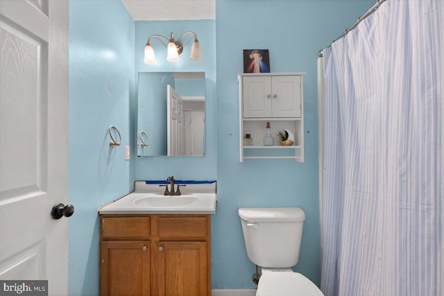 144 Falcon Trl, Winchester, VA 22602 - bathroom with toilet, vanity, and a shower with curtain