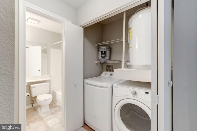 washroom featuring washing machine and clothes dryer