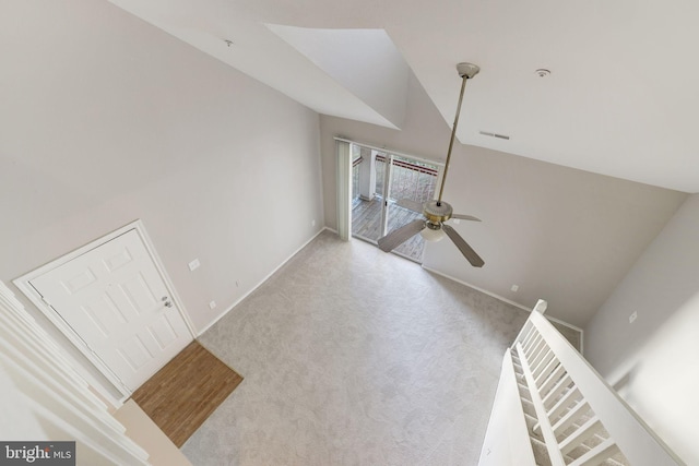 spare room featuring ceiling fan, baseboards, and carpet floors