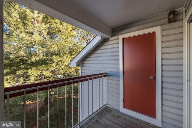entrance to property with a balcony
