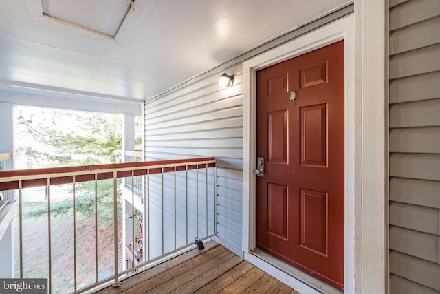 property entrance featuring covered porch