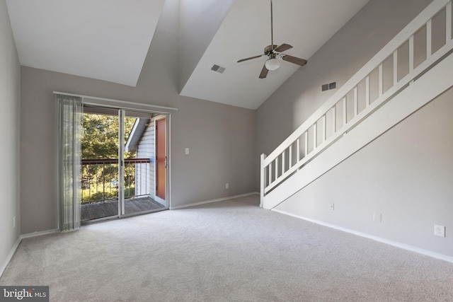 unfurnished living room featuring high vaulted ceiling, carpet, ceiling fan, and baseboards