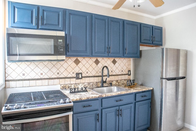 5519 Minnoka Ave, Baltimore, MD 21215 - kitchen featuring stainless steel appliances, blue cabinets, a sink, crown molding, and tasteful backsplash