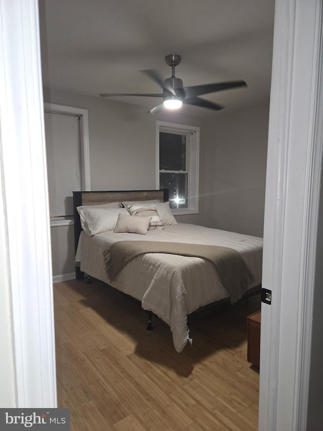 5519 Minnoka Ave, Baltimore, MD 21215 - bedroom featuring wood finished floors and ceiling fan