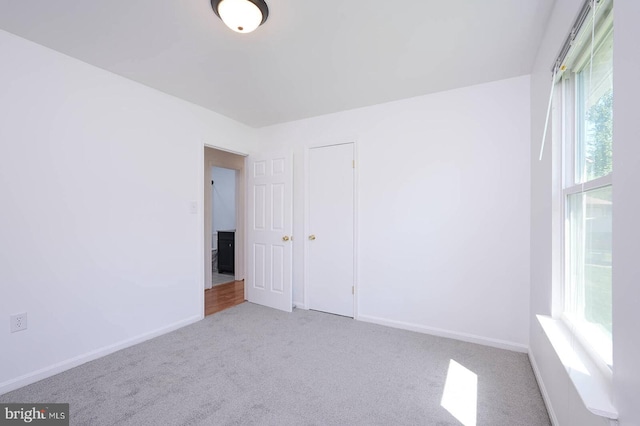 2012 All Hallows Ct, Waldorf, MD 20602 - carpeted empty room with baseboards