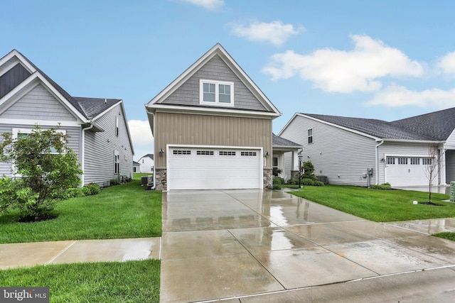 craftsman inspired home with stone siding, board and batten siding, driveway, and a front yard