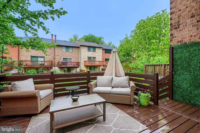 deck featuring outdoor lounge area