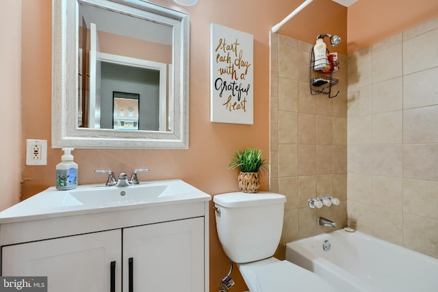 full bath featuring toilet, shower / washtub combination, and vanity