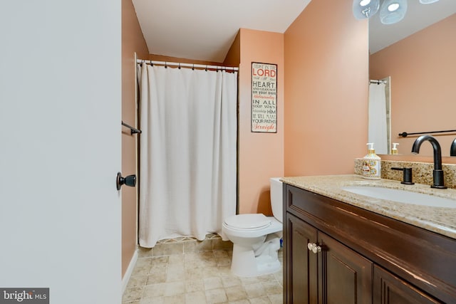 full bath featuring toilet, vanity, and curtained shower