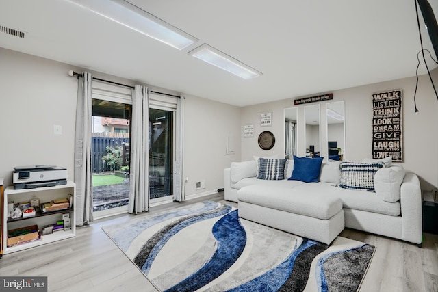 living area featuring light wood-style flooring