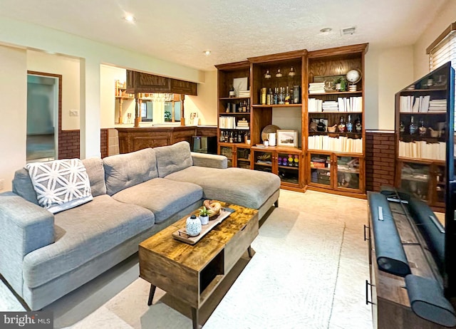 carpeted living room with recessed lighting