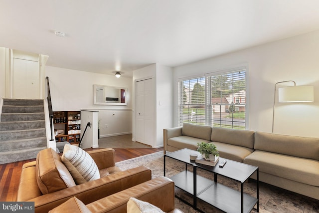 12821 Flagship Ave, Herndon, VA 20170 - living area featuring stairway, wood finished floors, and baseboards