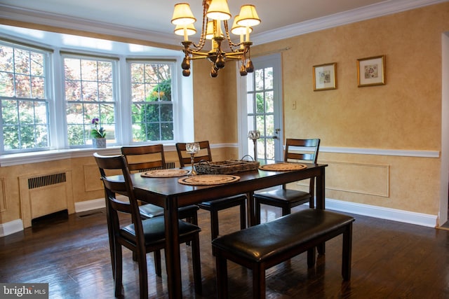 615 Bryn Mawr Ave, Penn Valley, PA 19072 - dining space with a chandelier, dark wood-style floors, ornamental molding, baseboards, and radiator