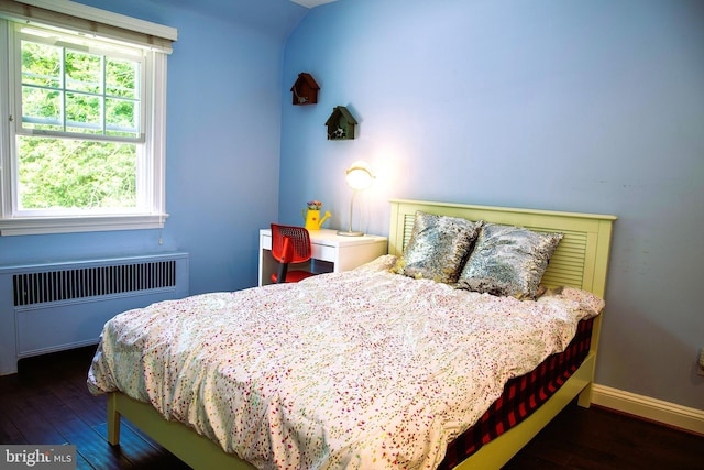 615 Bryn Mawr Ave, Penn Valley, PA 19072 - bedroom with radiator heating unit, wood-type flooring, baseboards, and vaulted ceiling