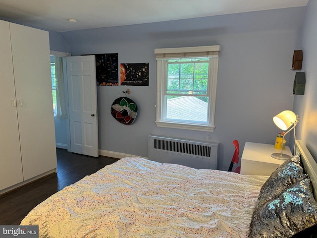 615 Bryn Mawr Ave, Penn Valley, PA 19072 - bedroom with radiator, dark wood finished floors, and baseboards
