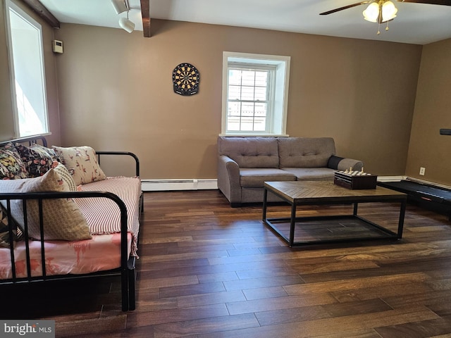 615 Bryn Mawr Ave, Penn Valley, PA 19072 - living room with baseboard heating, ceiling fan, and dark wood-style floors