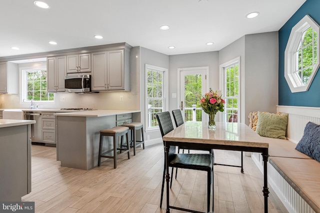 8412 Riverside Rd, Alexandria, VA 22308 - dining area with light wood-style floors and recessed lighting
