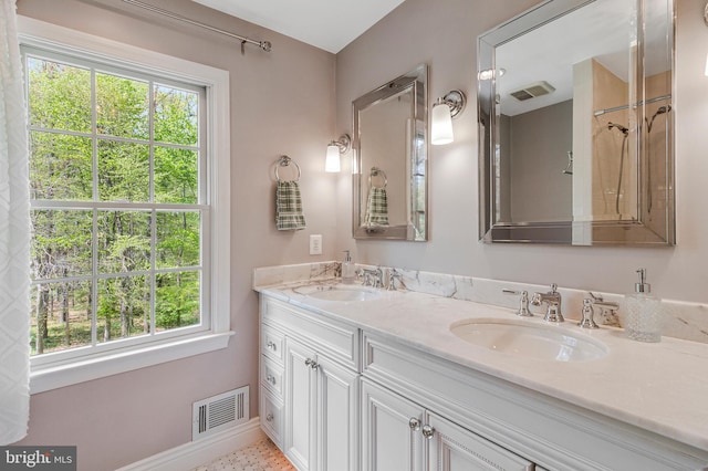 8412 Riverside Rd, Alexandria, VA 22308 - bathroom with baseboards, double vanity, and curtained shower