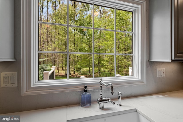 8412 Riverside Rd, Alexandria, VA 22308 - kitchen view of a sink and light stone counters