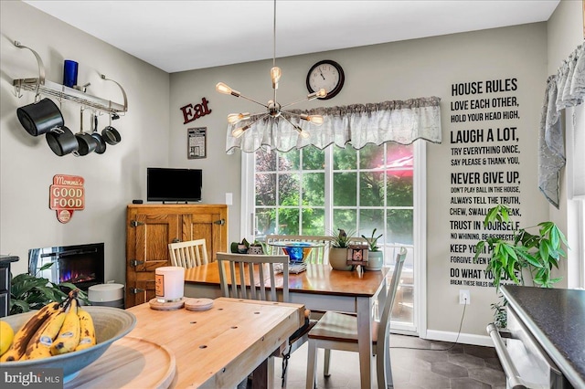 511 Abrams Ct, Bear, DE 19701 - dining space with a chandelier and baseboards