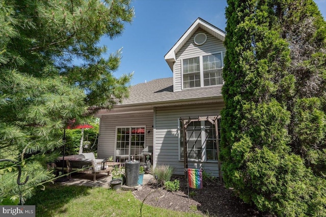 511 Abrams Ct, Bear, DE 19701 - back of property featuring a patio area and roof with shingles
