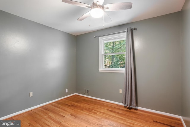 903 Burnt Crest Ln, Silver Spring, MD 20903 - unfurnished room with light wood-style flooring, a ceiling fan, and baseboards
