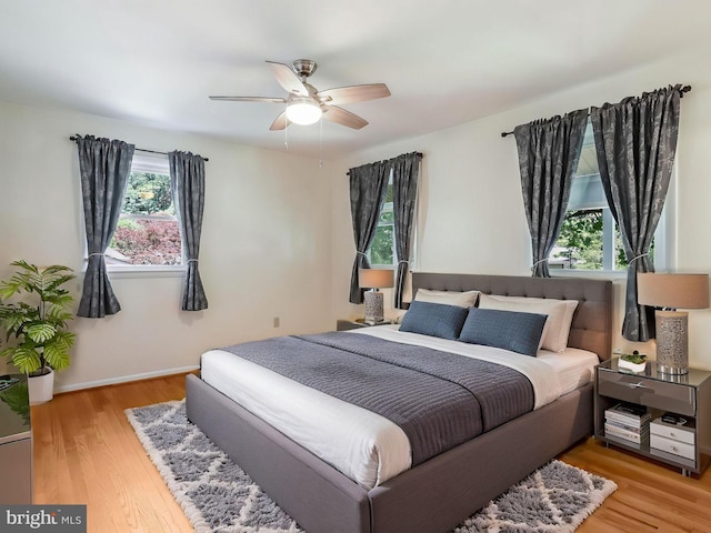 903 Burnt Crest Ln, Silver Spring, MD 20903 - bedroom featuring wood finished floors, a ceiling fan, and baseboards