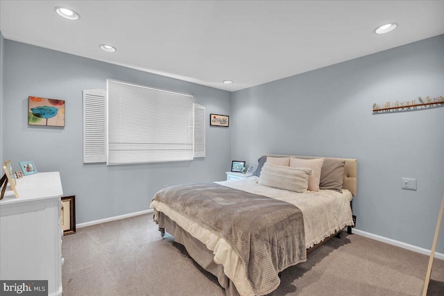 carpeted bedroom with recessed lighting and baseboards