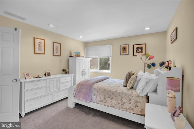 bedroom featuring carpet and recessed lighting