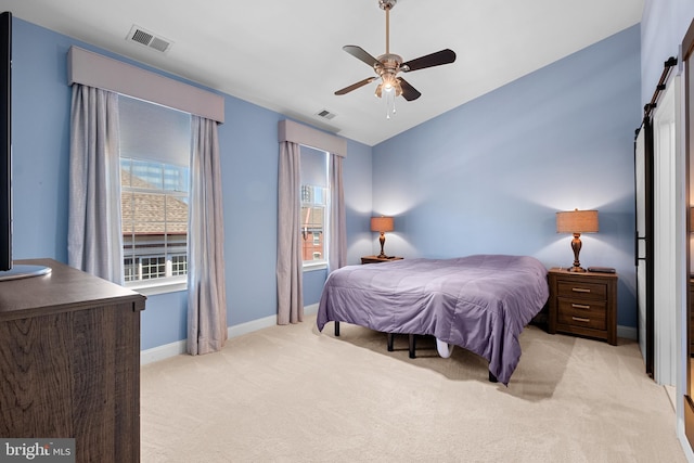 110 Commodore Ct, Philadelphia, PA 19146 - bedroom with light colored carpet, baseboards, and a ceiling fan