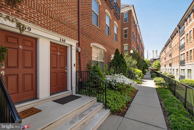 110 Commodore Ct, Philadelphia, PA 19146 - view of exterior entry featuring brick siding and fence