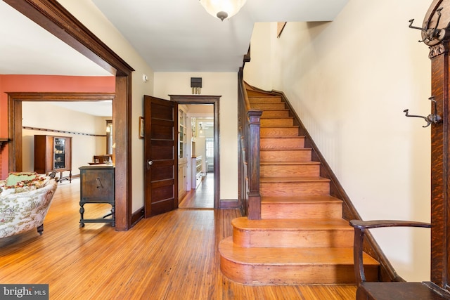 3650 Park Pl NW, Washington, DC 20010 - stairway with hardwood / wood-style flooring