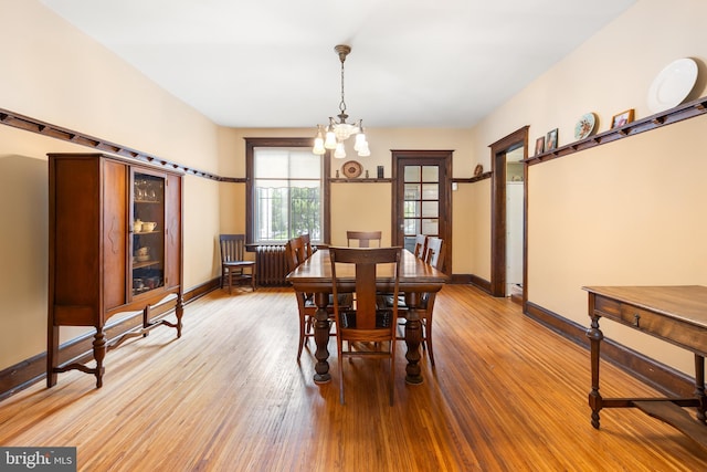 3650 Park Pl NW, Washington, DC 20010 - dining space featuring a chandelier and wood finished floors