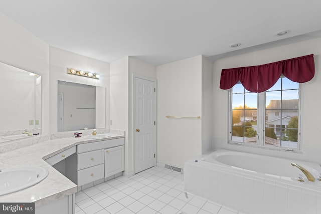 1004 Hostetter Rd, Hanover, PA 17331 - full bath featuring double vanity, a bath, and tile patterned floors