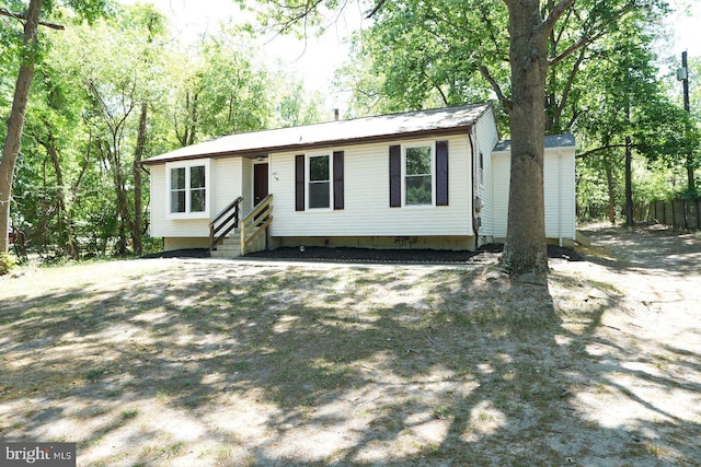 view of front of home with entry steps