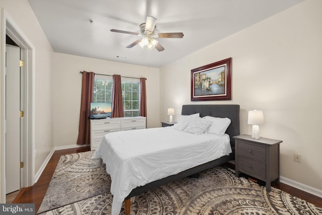 4561 Strutfield Ln Unit 3218, Alexandria, VA 22311 - bedroom featuring baseboards, wood finished floors, and a ceiling fan