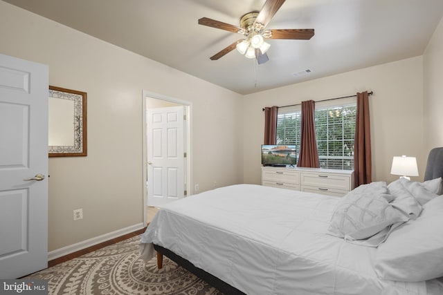 4561 Strutfield Ln Unit 3218, Alexandria, VA 22311 - bedroom with baseboards, wood finished floors, and ceiling fan