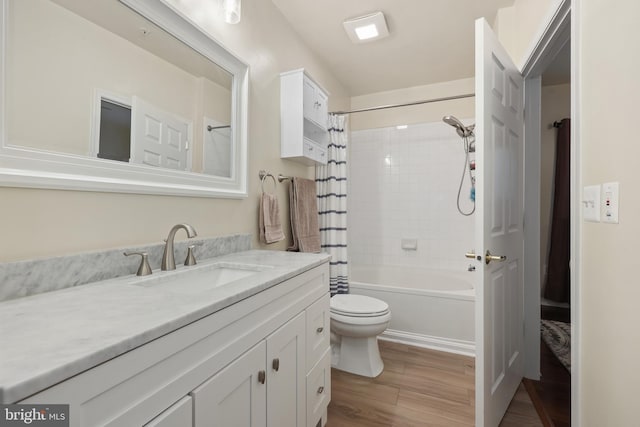 4561 Strutfield Ln Unit 3218, Alexandria, VA 22311 - bathroom with toilet, vanity, wood finished floors, and shower / bathtub combination with curtain
